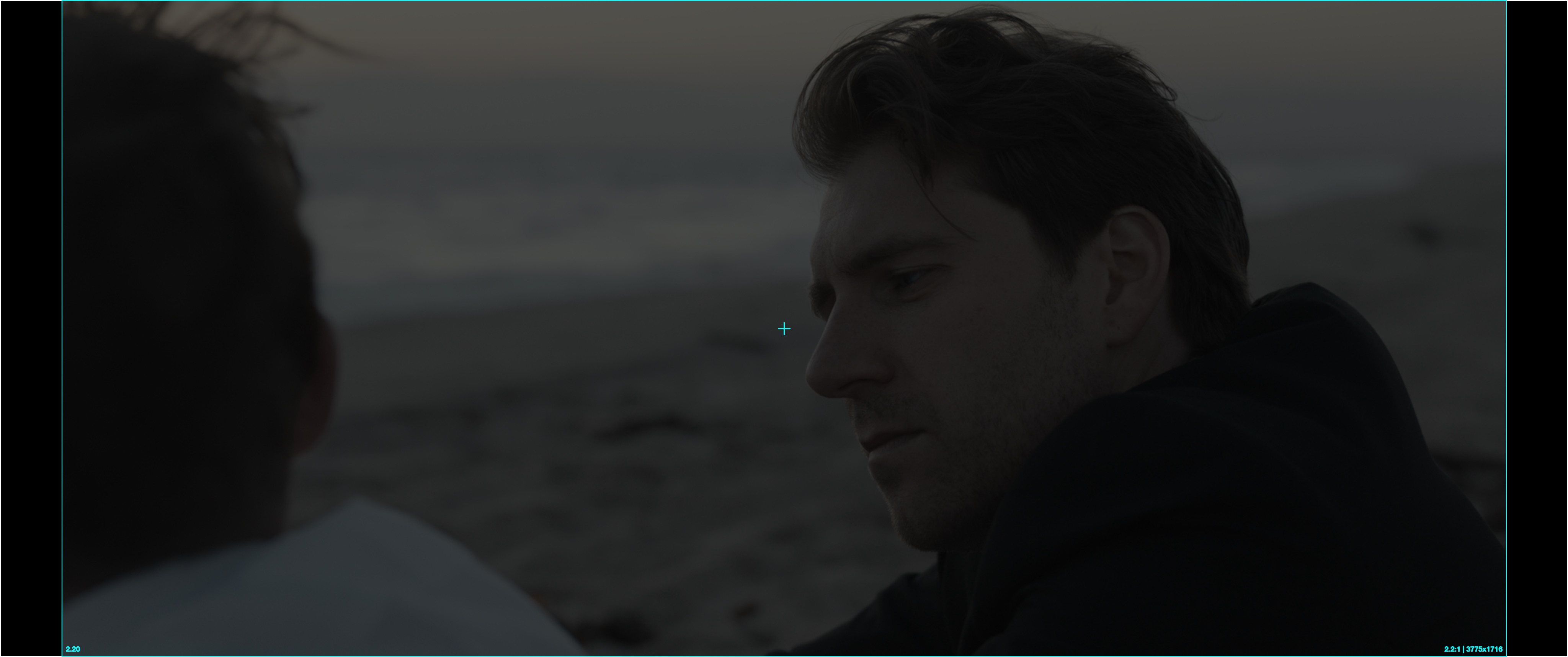 A 2.20:1 active image pillarboxed inside a Scope DCP and projected on a Scope-native screen, leaving only narrow side bars.